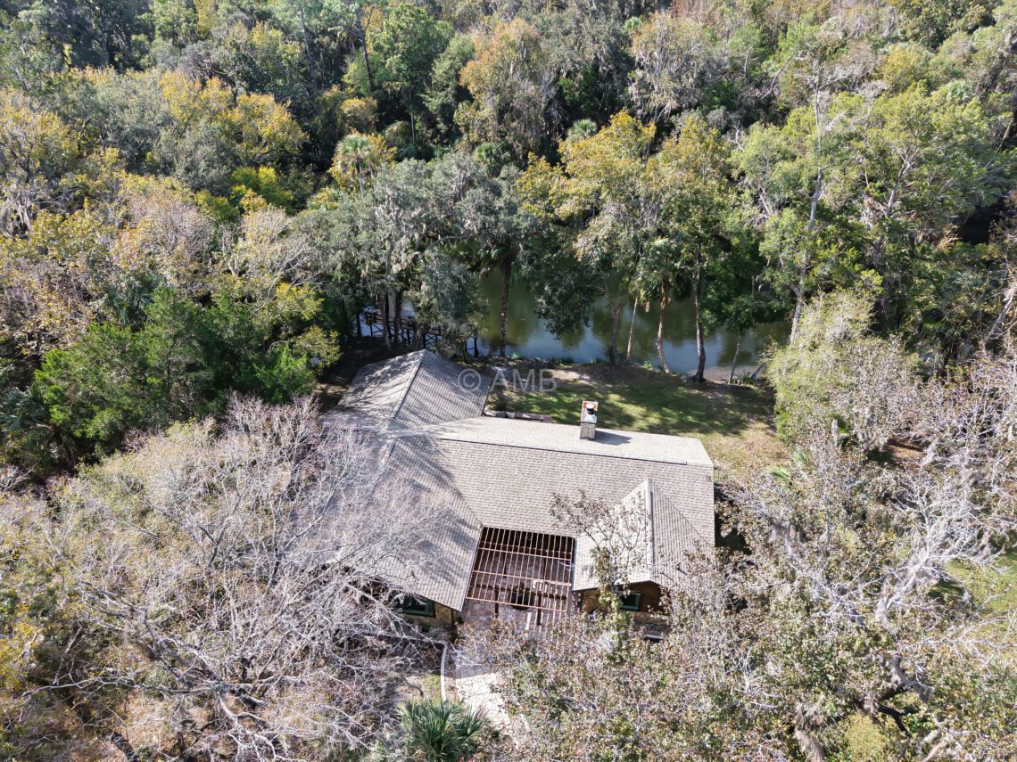 Aerial photo of waterfront home on the Withlacoochee River for sale in Inglis, Florida.
