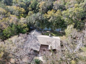 Aerial photo of waterfront home on the Withlacoochee River for sale in Inglis, Florida.